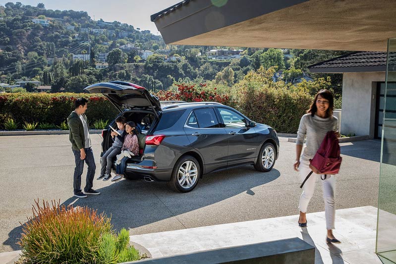 Family sitting in the back of the Chevrolet Equinox