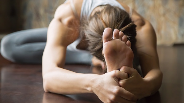 Woman stretching on a floor