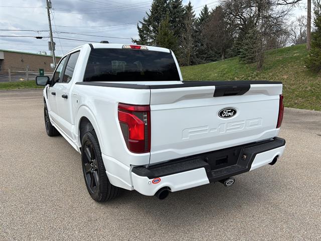 View vehicle photo 2