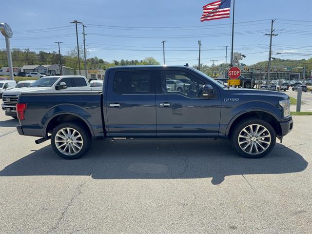 View vehicle photo 3