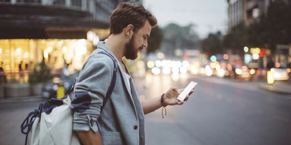 Man using a smartphone outside
