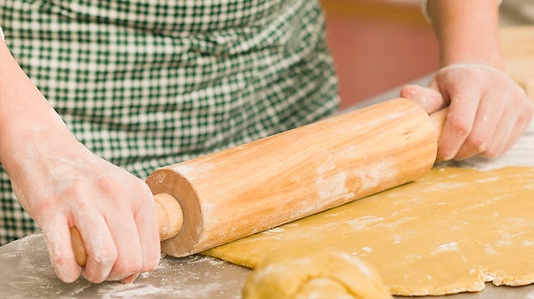 Hands and Rolling Pin