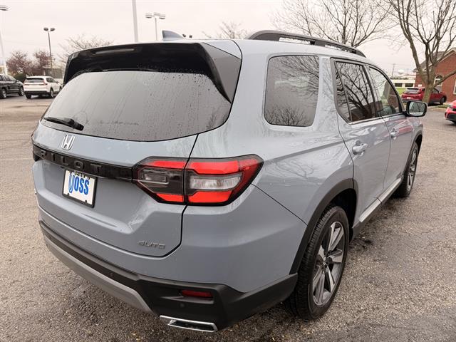 View vehicle photo 3