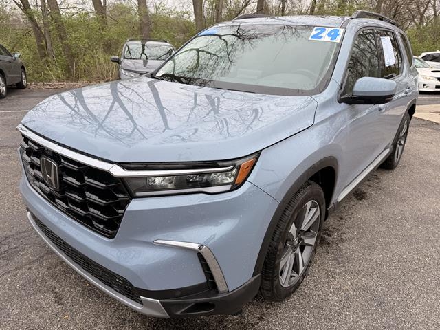 View vehicle photo 7