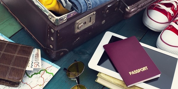 Suitcase and travel documents