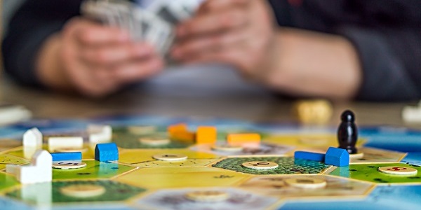 Person playing a board game