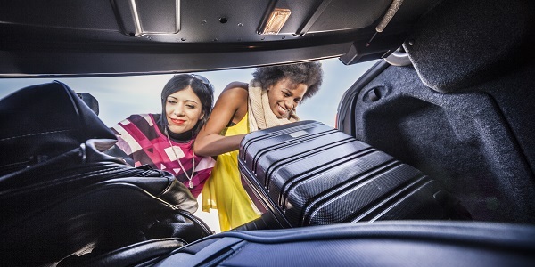 Loading suitcases in car