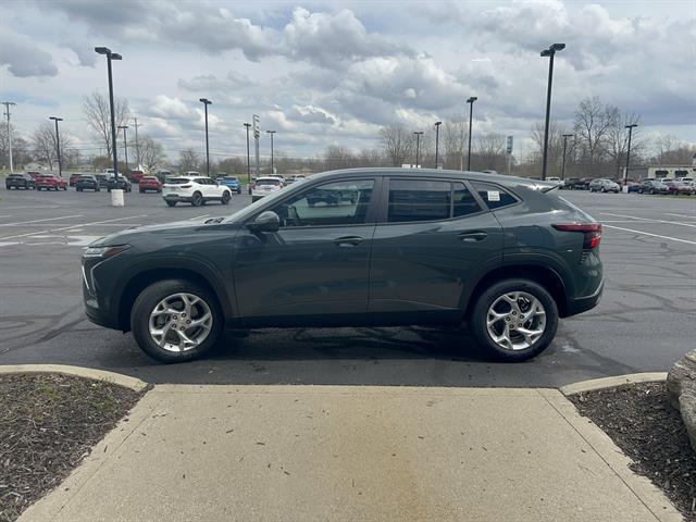 View vehicle photo 3