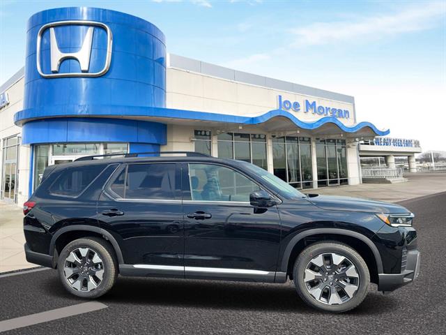 View vehicle photo 3