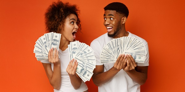 Couple holding money