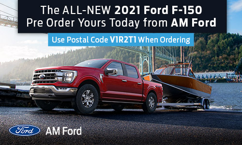 2021 Ford F-150 towing boat by water