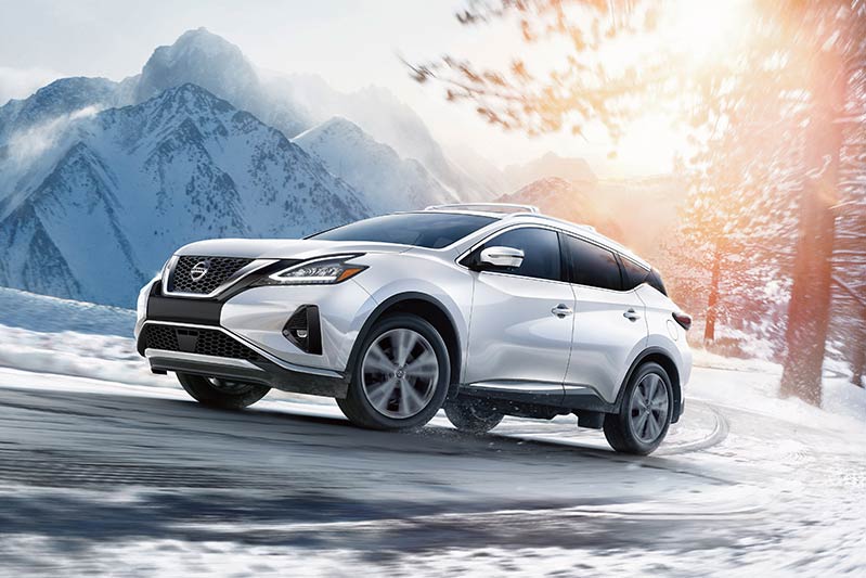 Nissan Murano in snowy mountains