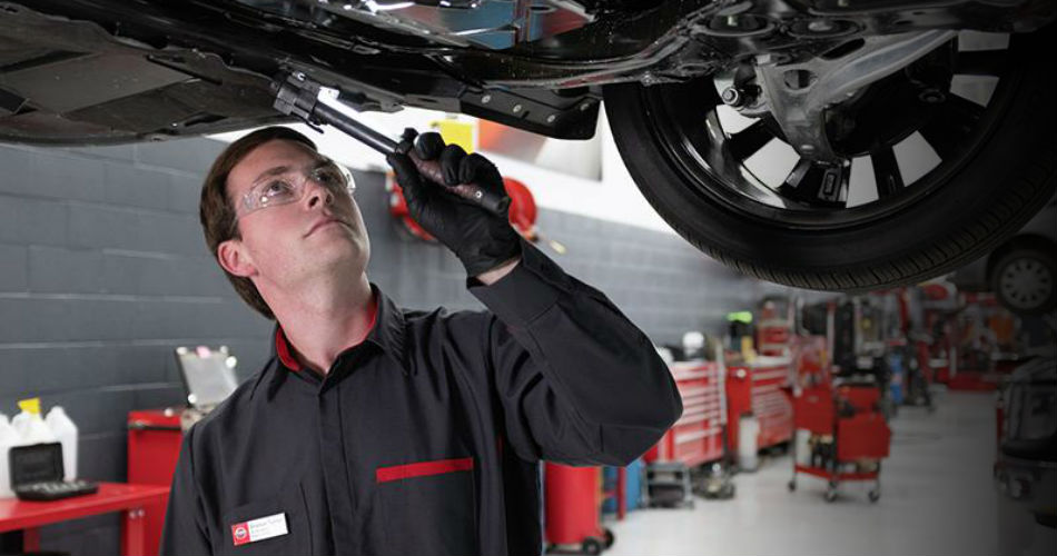 employee working on car